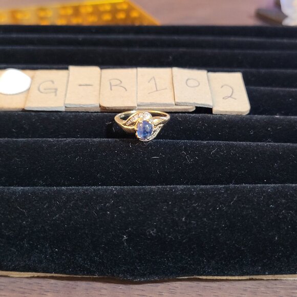 Item # GR10214K Gold Blue center stone tiny diamonds ring size 5